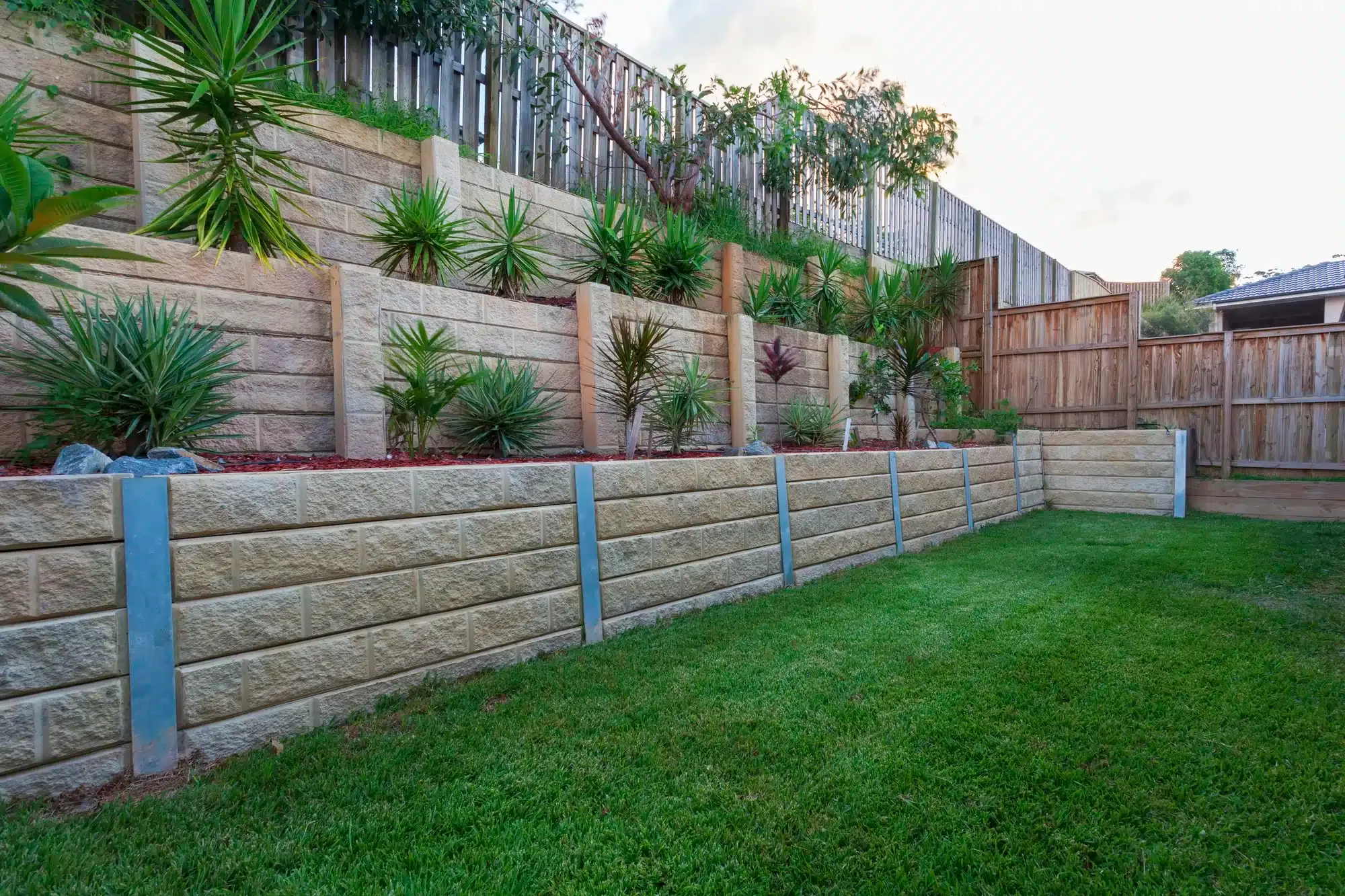 Concrete sleeper retaining wall with garden landscaping on the Mornington Peninsula
