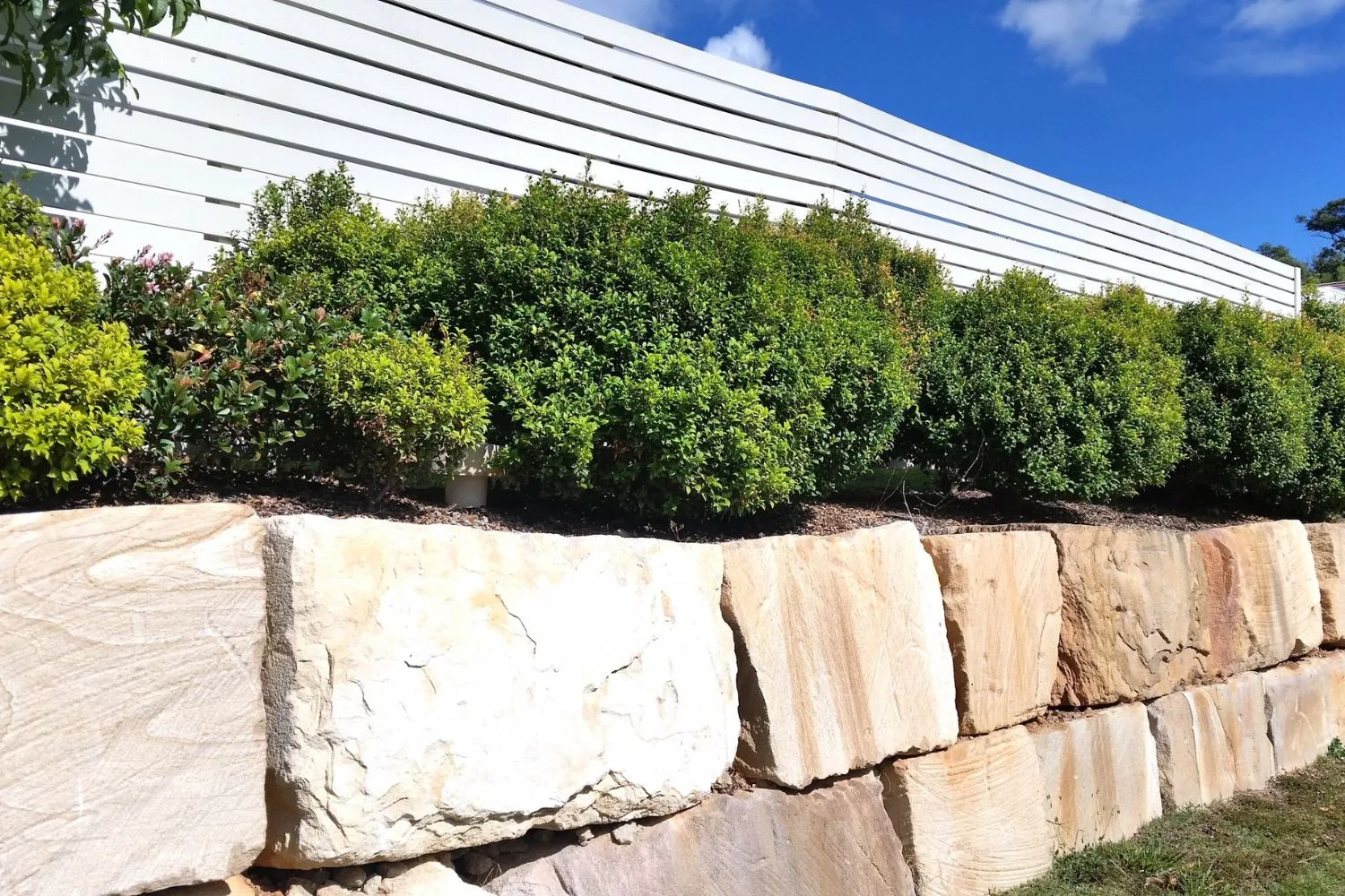 Sandstone block retaining wall close-up