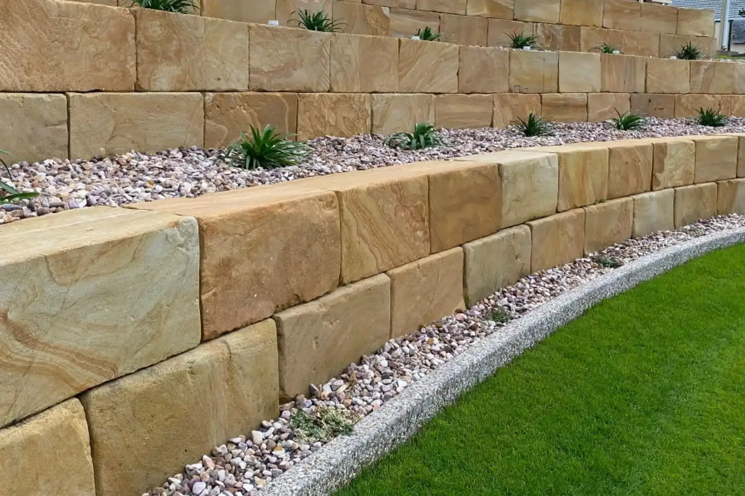 Tiered sandstone retaining wall built to last on the Mornington Peninsula